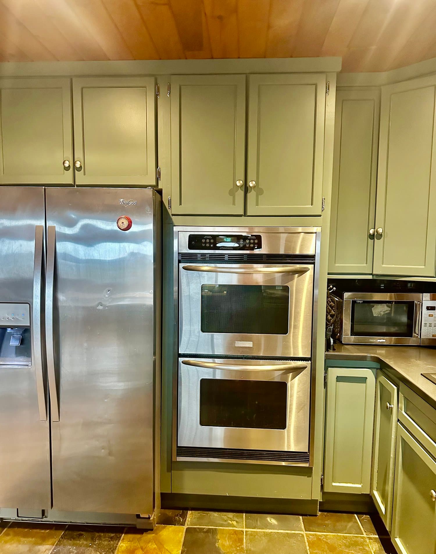 Kitchen with stainless steel fridge and double wall ovens