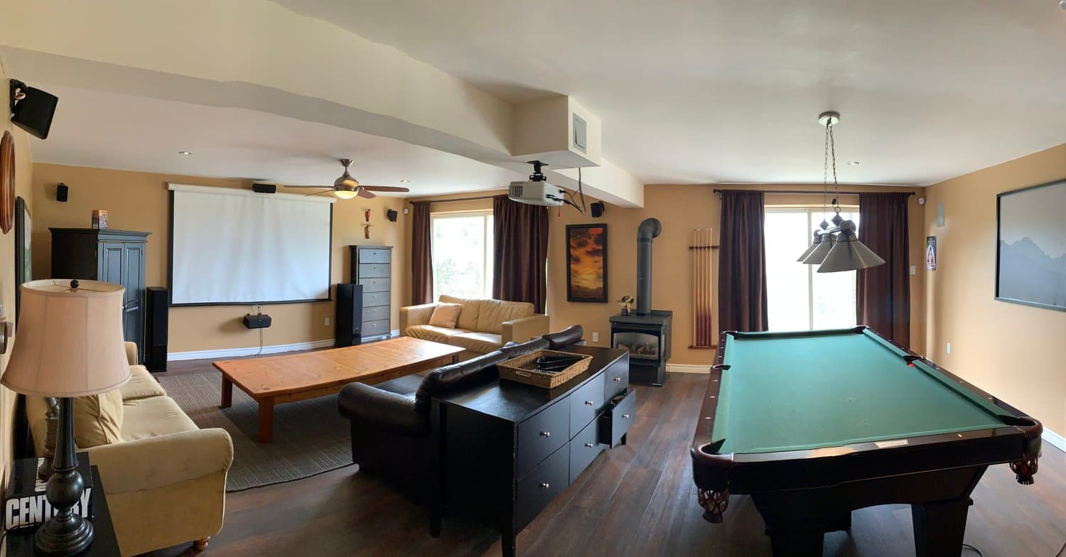 Recreation room with pool table and projection screen