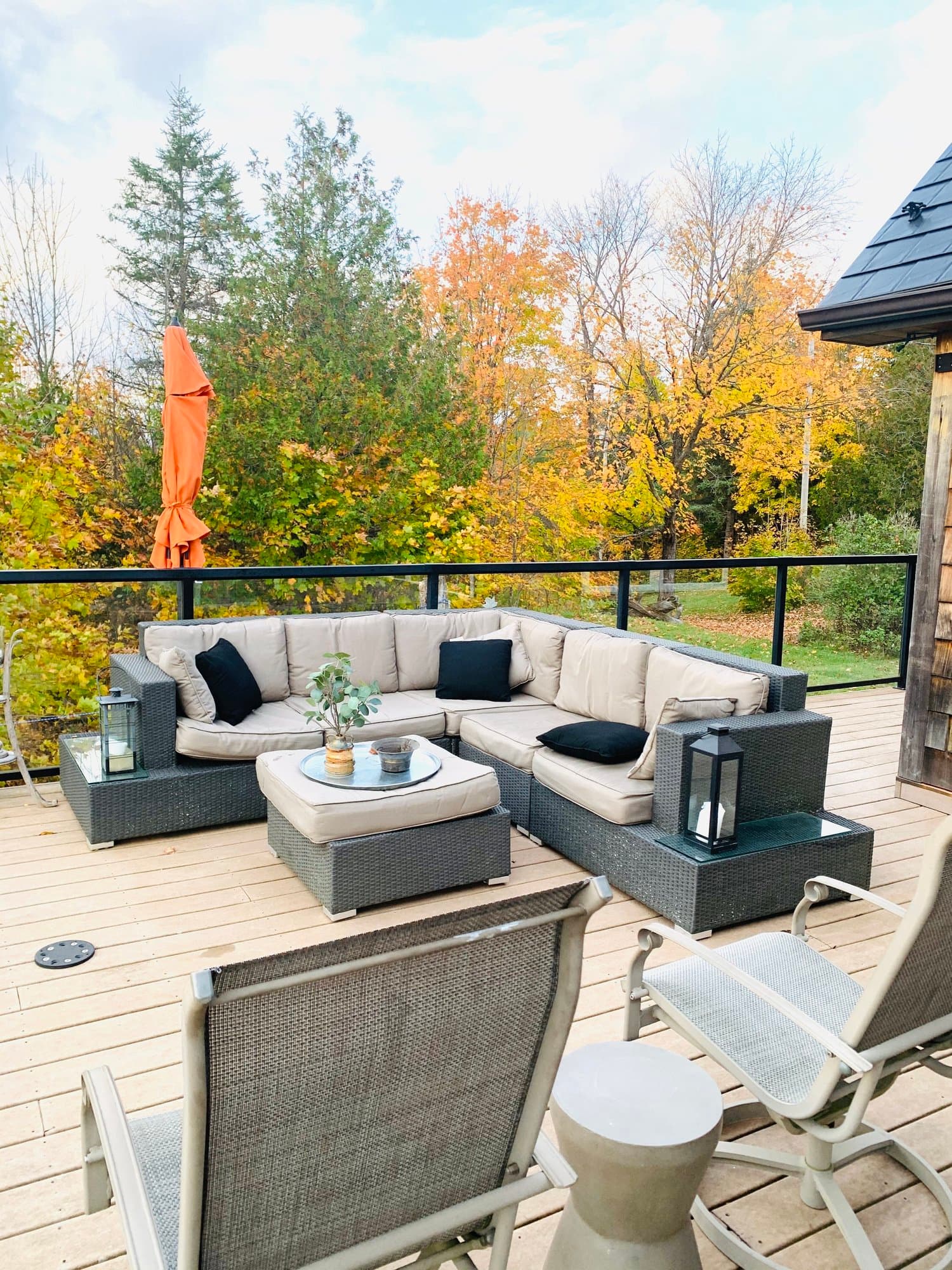 Deck lounge furniture and fall trees