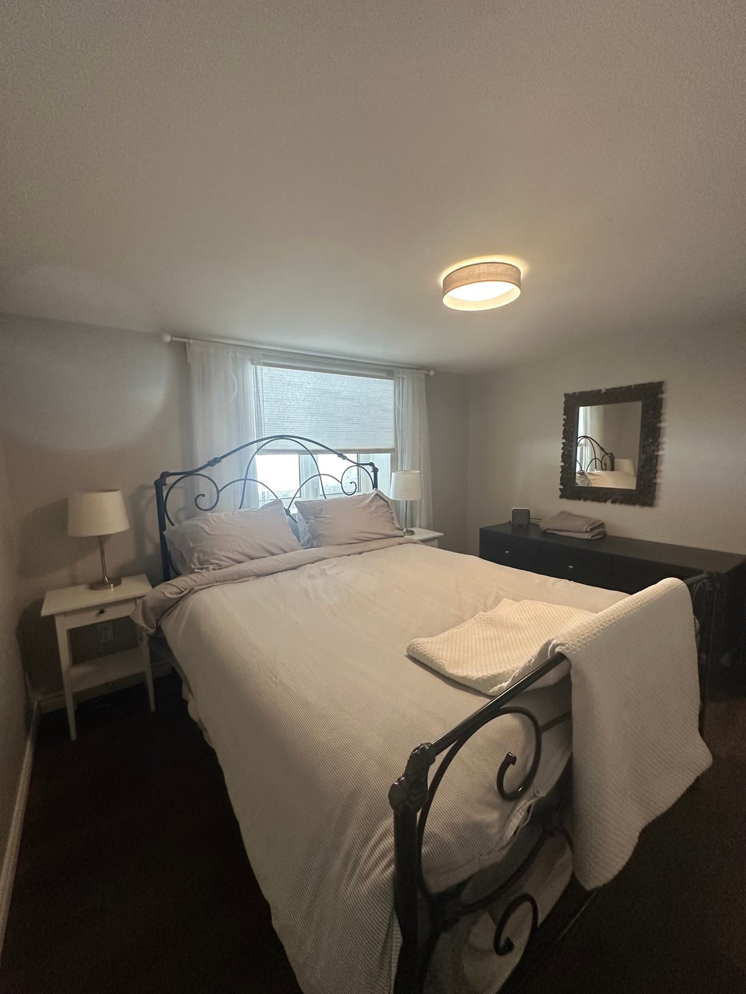 Bedroom with a wrought iron bed