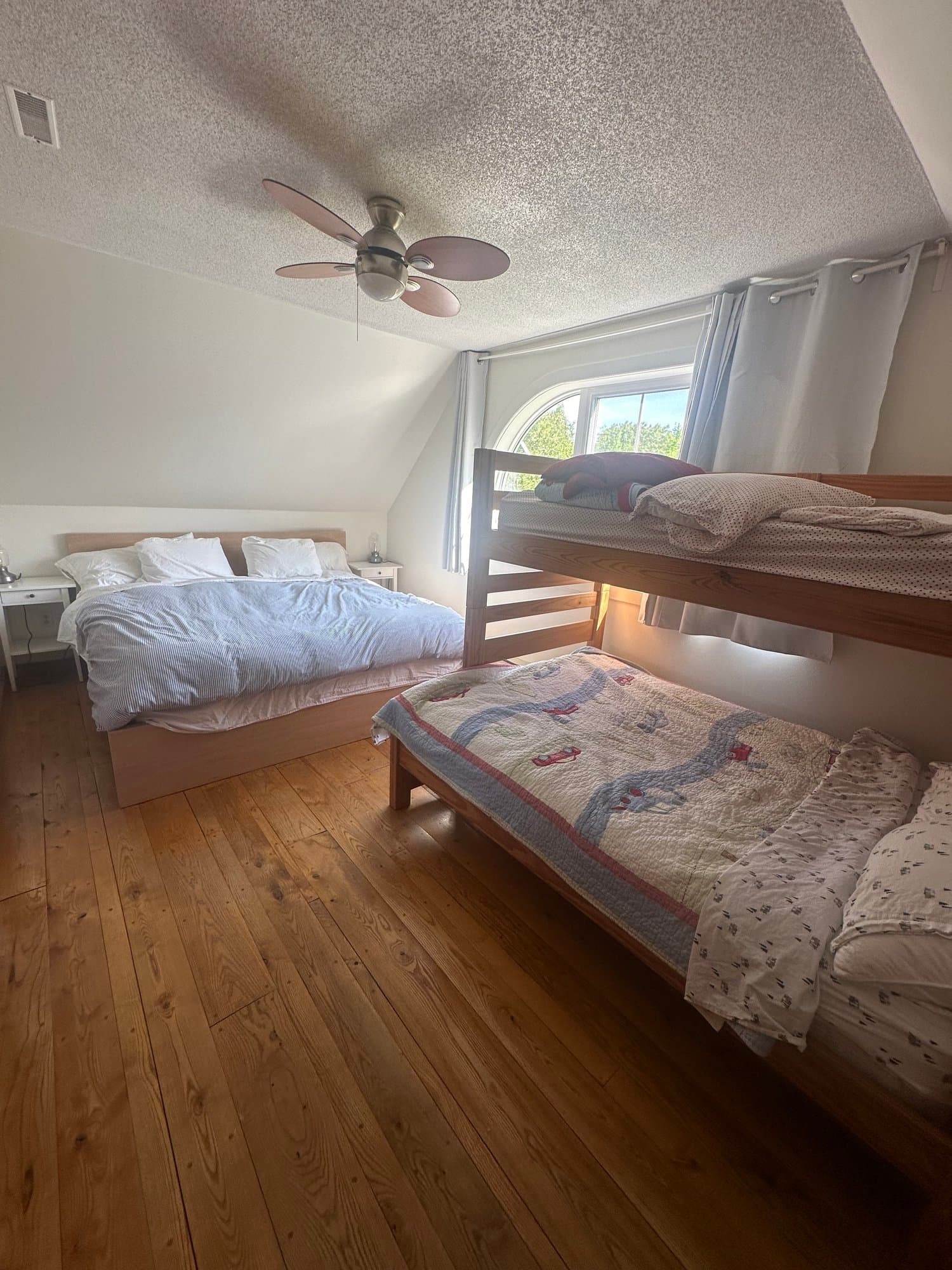 Bunk room with a double bed and bunk beds