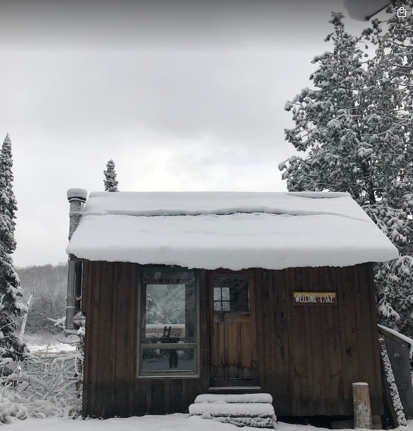 Snow-covered bunkie in winter