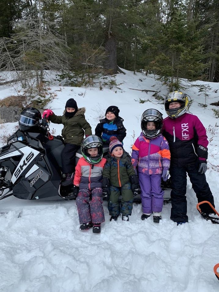 Kids with snowmobiles