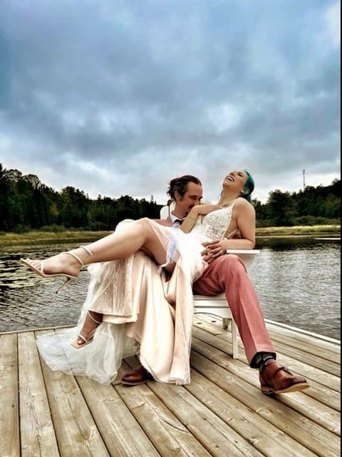 Couple laughing on the dock