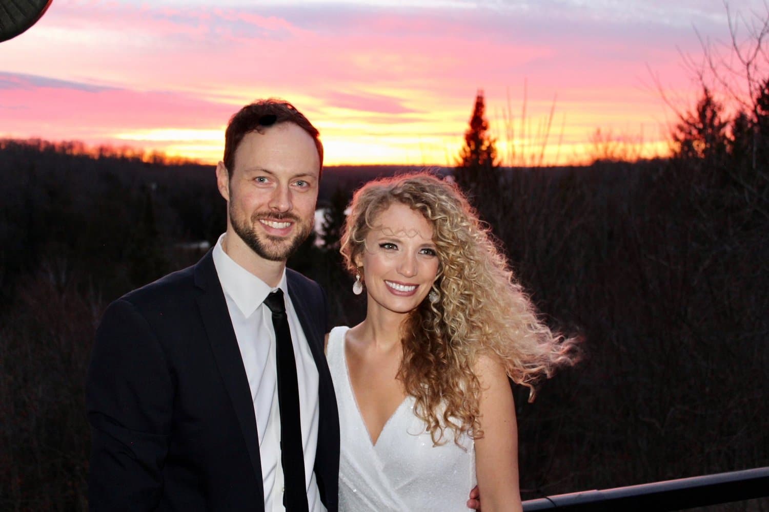 Couple at sunset over the hills