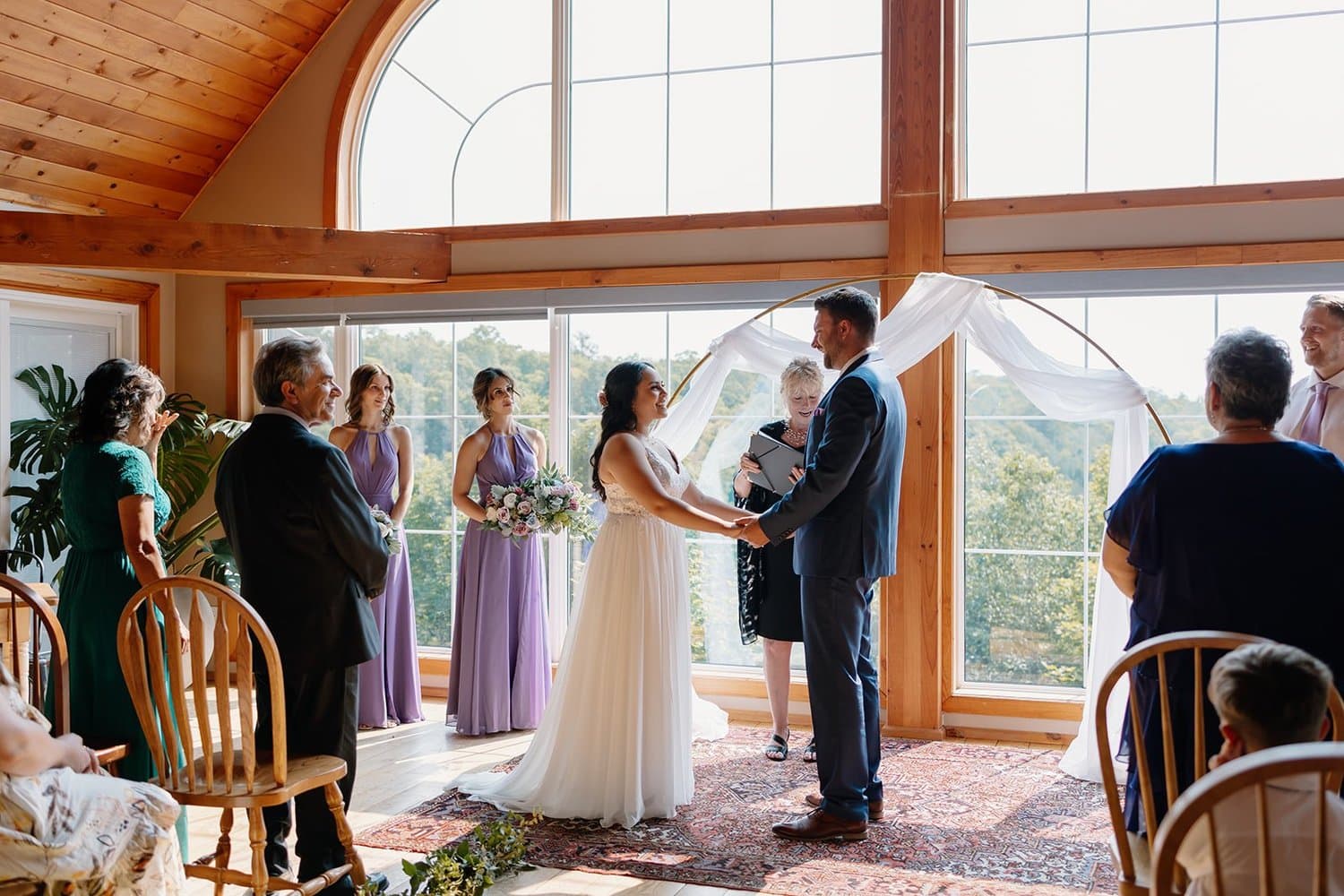 Ceremony in front of the great room windows
