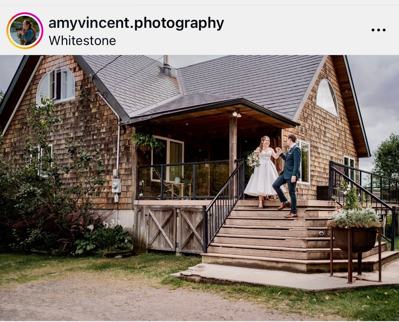 Couple on the front steps of the cottage
